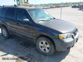 2007 Ford Escape XLT with VIN 1FMYU03167KA10635, listed as a IAAI auction lot 42009859 with 1 mi miles. Bid and sale history available at carsss.com. Image 1.