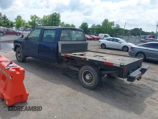 2000 GMC Sierra 3500 z VIN 1GTGC33R1YF502154, wystawiony jako IAAI lot #42183662 z przebiegiem 157 504 mil mil oraz . Historia ofert i sprzedaży dostępna na DreamBid. Obrazek 3.