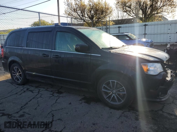 2017 Dodge Grand Caravan SXT with VIN 2C4RDGCGXHR630283, listed as a Copart auction lot 52793665 with 157,673 mi miles and Salvage Title. Bid and sale history available at DreamBid. Image 4.