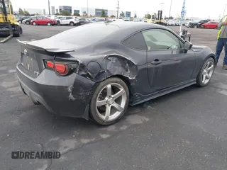 2014 Scion FR-S z VIN JF1ZNAA1XE8707577, wystawiony jako IAAI lot #42054339 z przebiegiem 95 241 mil mil oraz . Historia ofert i sprzedaży dostępna na DreamBid. Obrazek 4.