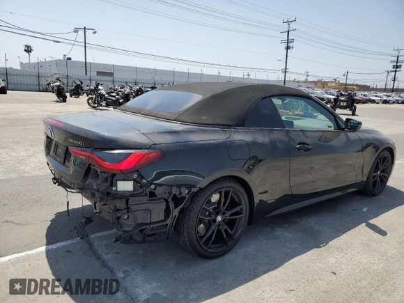 2022 BMW 4 Series M440i with VIN WBA53AT01NCJ52404, listed as a Copart auction lot 54464474 with 16,880 mi miles and Salvage title. Bid and sale history available at DreamBid. Image 3.