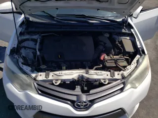 2016 Toyota Corolla L z VIN 5YFBURHE5GP516744, wystawiony jako Copart lot #56252835 z przebiegiem 122 338 mil mil oraz Szkoda całkowita • Salvage title. Historia ofert i sprzedaży dostępna na DreamBid. Obrazek 11.