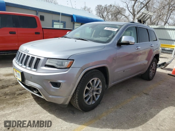 2014 Jeep Grand Cherokee Overland with VIN 1C4RJFCG4EC326325, listed as a Copart auction lot 49166645 with 128,261 mi miles and Salvage Title. Bid and sale history available at DreamBid. Image 1.