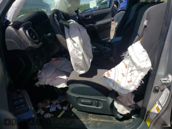 2022 Toyota Tacoma SR with VIN 3TMCZ5AN4NM470997, listed as a Copart auction lot 55165855 with 67,161 mi miles and Salvage title. Bid and sale history available at DreamBid. Image 7.