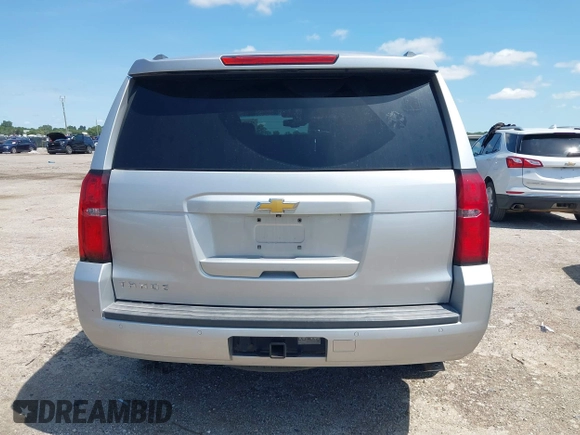 2015 Chevrolet Tahoe LT with VIN 1GNSCBKC9FR223426, listed as a IAAI auction lot 42352698 with 128,339 mi miles and . Bid and sale history available at DreamBid. Image 16.