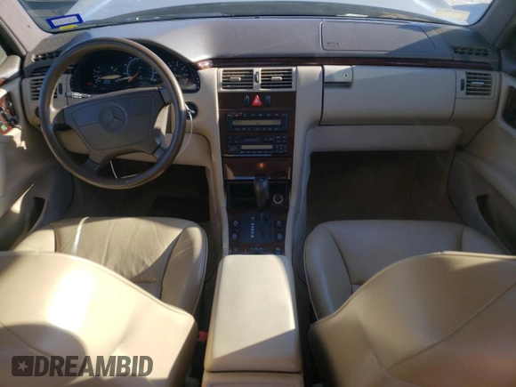 1996 Mercedes-Benz E-Class with VIN WDBJF55F7TJ022765, listed as a Copart auction lot 70577504 with 186,340 mi miles and Salvage Title. Bid and sale history available at carsss.com. Image 8.