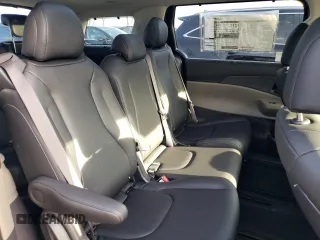 2025 Kia Carnival SX with VIN KNDNE5K33S6486847, listed as a Copart auction lot 82099044 with 10 mi miles and Salvage Title. Bid and sale history available at carsss.com. Image 10.