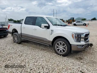 2023 Ford F-150 XL with VIN 1FTFW1ED6PFC00883, listed as a Copart auction lot 60438105 with 27,640 mi miles and Salvage title. Bid and sale history available at DreamBid. Image 4.