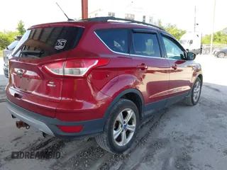 2013 Ford Escape SE with VIN 1FMCU9G9XDUC12697, listed as a IAAI auction lot 42197774 with 174,263 mi miles and . Bid and sale history available at DreamBid. Image 4.