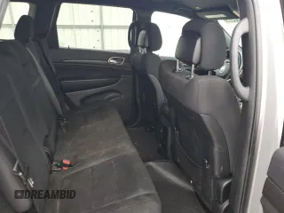 2017 Jeep Grand Cherokee Laredo with VIN 1C4RJEAG0HC664063, listed as a Copart auction lot 54850295 with 82,913 mi miles and Salvage title. Bid and sale history available at DreamBid. Image 11.