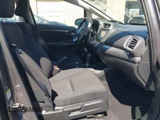 2015 Honda Fit EX-L z VIN 3HGGK5H86FM746265, wystawiony jako IAAI lot #42253205 z przebiegiem 75 491 mil mil oraz . Historia ofert i sprzedaży dostępna na DreamBid. Obrazek 5.