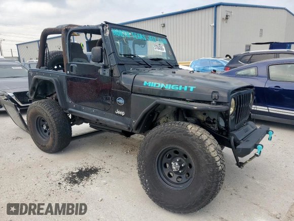 2005 Jeep Wrangler X with VIN 1J4FA39S25P367360, listed as a Copart auction lot 57504365 with 112,125 mi miles and Salvage title. Bid and sale history available at DreamBid. Image 4.