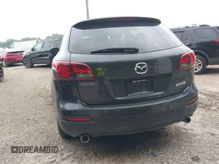 2015 Mazda CX-9 Touring with VIN JM3TB2CA5F0452775, listed as a IAAI auction lot 42659258 with 129,948 mi miles and . Bid and sale history available at DreamBid. Image 16.
