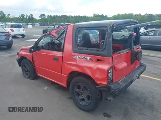 1995 Chevrolet Tracker z VIN 2CNBJ1869S6902771, wystawiony jako IAAI lot #41997456 z przebiegiem 171 629 mil mil oraz . Historia ofert i sprzedaży dostępna na DreamBid. Obrazek 3.