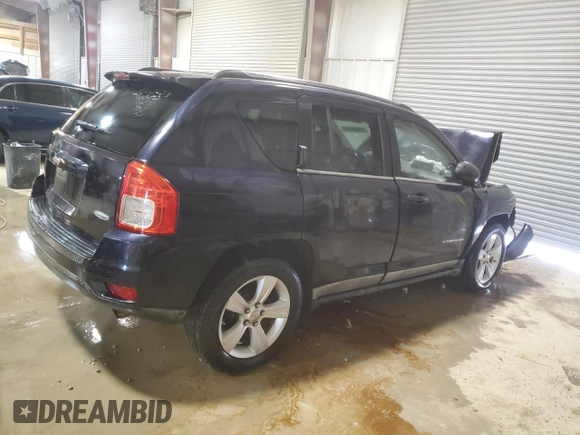 2011 Jeep Compass with VIN 1J4NT1FB8BD192253, listed as a Copart auction lot 87692135 with 0 mi miles and Salvage Title. Bid and sale history available at carsss.com. Image 3.