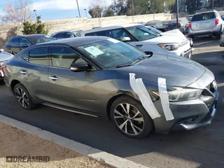 2018 Nissan Maxima SL with VIN 1N4AA6AP0JC363808, listed as a IAAI auction lot 41231430 with 142,955 mi miles. Bid and sale history available at carsss.com. Image 13.