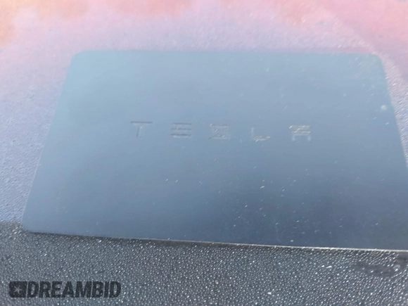 2018 Tesla Model 3 Long Range Battery with VIN 5YJ3E1EA0JF153146, listed as a IAAI auction lot 41621919 with 76,794 mi miles and . Bid and sale history available at DreamBid. Image 11.