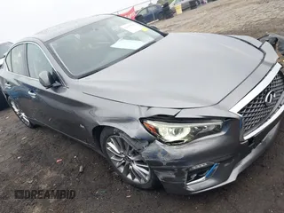 2019 Infiniti Q50 Luxe z VIN JN1EV7AP5KM518681, wystawiony jako IAAI lot #41958746 z przebiegiem 66 629 mil mil oraz . Historia ofert i sprzedaży dostępna na DreamBid. Obrazek 1.