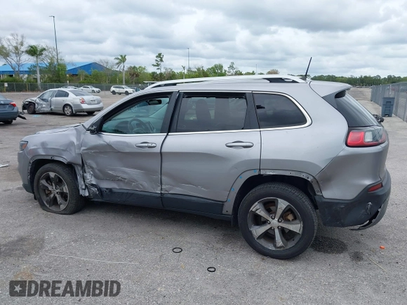 2020 Jeep Cherokee Limited with VIN 1C4PJLDB2LD560723, listed as a IAAI auction lot 41658092 with 73,978 mi miles. Bid and sale history available at carsss.com. Image 6.