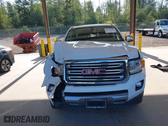 2015 GMC Canyon 2WD SLE with VIN 1GTG5CEA1F1273955, listed as a IAAI auction lot 42392908 with 79,981 mi miles and . Bid and sale history available at DreamBid. Image 12.