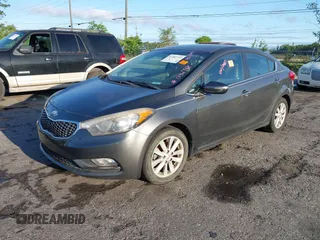 2014 Kia Forte EX with VIN KNAFX4A81E5046798, listed as a IAAI auction lot 41982719 with 141,138 mi miles. Bid and sale history available at carsss.com. Image 2.