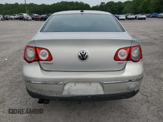 2009 Volkswagen Passat z VIN WVWJK93C49P054575, wystawiony jako Copart lot #57880855 z przebiegiem 148 327 mil mil oraz Szkody całkowita. Historia ofert i sprzedaży dostępna na DreamBid. Obrazek 6.