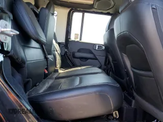 2023 Jeep Wrangler Sahara z VIN 1C4JJXP66PW605961, wystawiony jako Copart lot #50209655 z przebiegiem 32 805 mil mil oraz Szkoda całkowita • Salvage title. Historia ofert i sprzedaży dostępna na DreamBid. Obrazek 11.