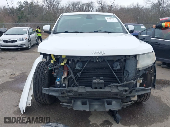 2013 Jeep Grand Cherokee Overland with VIN 1C4RJECG5DC648593, listed as a IAAI auction lot 41576630 with 187,098 mi miles. Bid and sale history available at carsss.com. Image 13.
