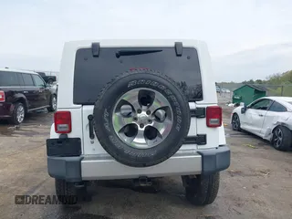 2017 Jeep Wrangler Unlimited Sahara with VIN 1C4BJWEG3HL752719, listed as a IAAI auction lot 41892600 with 127,486 mi miles. Bid and sale history available at carsss.com. Image 17.
