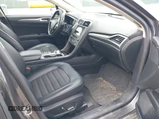 2017 Ford Fusion SE z VIN 3FA6P0H76HR354078, wystawiony jako IAAI lot #42103550 z przebiegiem 103 201 mil mil oraz . Historia ofert i sprzedaży dostępna na DreamBid. Obrazek 5.