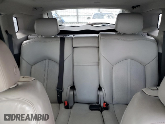 2014 Cadillac SRX Premium Collection z VIN 3GYFNGE30ES627895, wystawiony jako Copart lot #58605985 z przebiegiem 49 300 mil mil oraz Szkoda całkowita • Salvage title. Historia ofert i sprzedaży dostępna na DreamBid. Obrazek 10.
