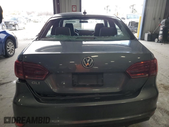 2014 Volkswagen Jetta GLI z VIN 3VW4T7AJ6EM398115, wystawiony jako Copart lot #89179925 z przebiegiem 81 264 mil mil oraz Szkoda całkowita • Salvage title. Historia ofert i sprzedaży dostępna na DreamBid. Obrazek 6.