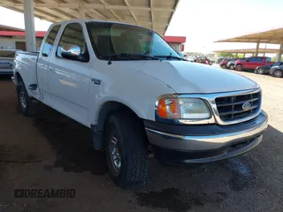 1997 Ford F-150 z VIN 1FTDX08W4VKC89238, wystawiony jako IAAI lot #42132010 z przebiegiem 204 386 mil mil oraz . Historia ofert i sprzedaży dostępna na DreamBid. Obrazek 1.