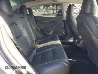 2023 Tesla Model 3 с VIN 5YJ3E1EA9PF412192, выставлен на аукционе Copart как лот 52122045 с пробегом 72 230 миль миль и Списание • Salvage title. История ставок и продаж доступна на DreamBid. Изображение 10.