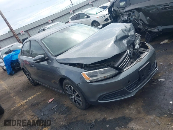 2014 Volkswagen Jetta SE z VIN 3VWD17AJ9EM298175, wystawiony jako IAAI lot #42084756 z przebiegiem 93 039 mil mil oraz . Historia ofert i sprzedaży dostępna na DreamBid. Obrazek 1.