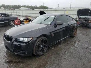 2011 BMW 3 Series 335is with VIN WBAKG1C59BE618082, listed as a Copart auction lot 59598765 with 134,331 mi miles and Salvage title. Bid and sale history available at DreamBid. Image 1.