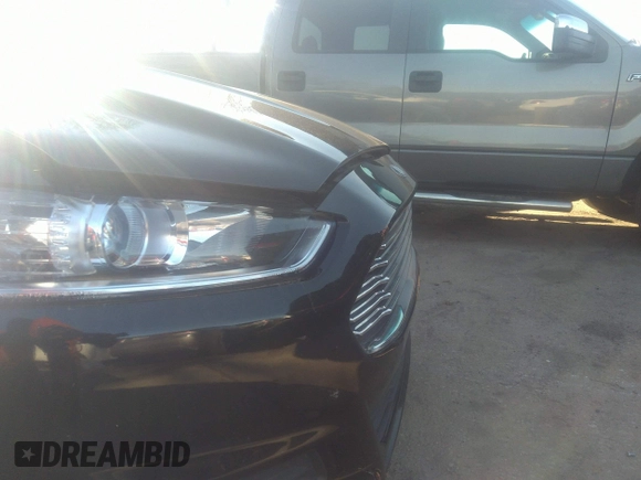 2015 Ford Fusion S Hybrid with VIN 3FA6P0UU9FR246868, listed as a IAAI auction lot 41307984 with 153,466 mi miles. Bid and sale history available at carsss.com. Image 12.