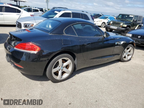 2013 BMW Z4 sDrive28i with VIN WBALL5C54DJ103864, listed as a Copart auction lot 74069774 with 36,161 mi miles and Salvage Title. Bid and sale history available at carsss.com. Image 3.