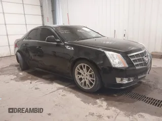 2011 Cadillac CTS Performance z VIN 1G6DL5ED8B0144029, wystawiony jako IAAI lot #40969817 z przebiegiem 151 097 mil mil oraz . Historia ofert i sprzedaży dostępna na DreamBid. Obrazek 1.