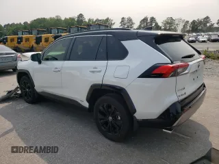 2023 Toyota RAV4 Hybrid XSE with VIN JTME6RFV5PJ034726, listed as a Copart auction lot 59105585 with 35,528 mi miles and Salvage title. Bid and sale history available at DreamBid. Image 2.