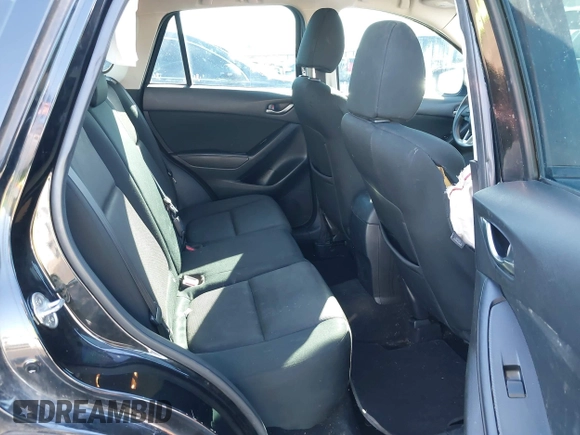2016 Mazda CX-5 Sport with VIN JM3KE4BY0G0662294, listed as a IAAI auction lot 41469721 with 127,116 mi miles and . Bid and sale history available at carsss.com. Image 8.