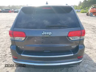 2015 Jeep Grand Cherokee Summit with VIN 1C4RJFJG0FC611768, listed as a IAAI auction lot 42468497 with 217,032 mi miles and . Bid and sale history available at DreamBid. Image 16.