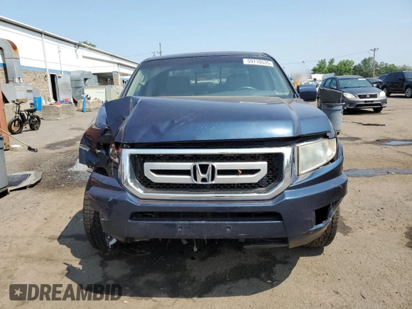 2010 Honda Ridgeline RTL with VIN 5FPYK1F5XAB004153, listed as a Copart auction lot 59710535 with Not provided miles and Salvage title. Bid and sale history available at DreamBid. Image 5.