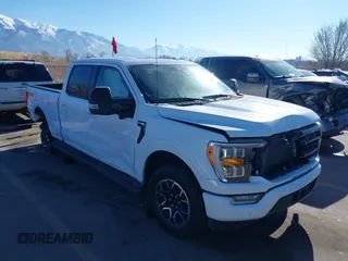 2023 Ford F-150 XL with VIN 1FTFW1E87PFB31057, listed as a IAAI auction lot 41388451 with 28,233 mi miles. Bid and sale history available at carsss.com. Image 1.