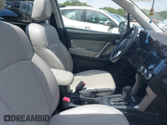 2017 Subaru Forester Touring z VIN JF2SJAWC1HH463163, wystawiony jako IAAI lot #42480107 z przebiegiem 70 337 mil mil oraz . Historia ofert i sprzedaży dostępna na DreamBid. Obrazek 5.