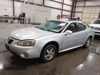 2004 Pontiac Grand Prix GT2 z VIN 2G2WS522641126247, wystawiony jako IAAI lot #42338014 z przebiegiem 236 735 mil mil oraz . Historia ofert i sprzedaży dostępna na DreamBid. Obrazek 2.