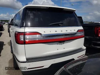 2020 Lincoln Navigator Black Label z VIN 5LMJJ3TT4LEL21595, wystawiony jako Copart lot #73951494 z przebiegiem Nie podano mil oraz Szkoda całkowita • Salvage title. Historia ofert i sprzedaży dostępna na DreamBid. Obrazek 6.