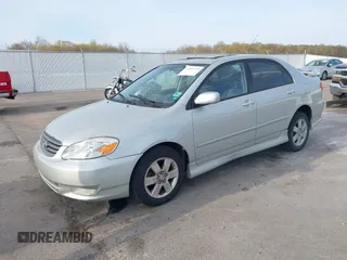 2003 Toyota Corolla CE with VIN 1NXBR32E63Z179629, listed as a IAAI auction lot 42043795 with 204,736 mi miles. Bid and sale history available at carsss.com. Image 2.