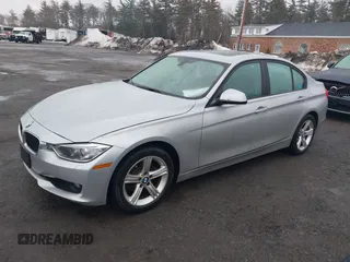 2013 BMW 3 Series 328i xDrive with VIN WBA3B5C58DF594087, listed as a IAAI auction lot 41710362 with 185,994 mi miles. Bid and sale history available at carsss.com. Image 2.
