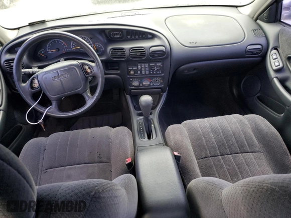 2000 Pontiac Grand Prix SE with VIN 1G2WJ52K5YF285584, listed as a Copart auction lot 84926094 with 123,146 mi miles and Salvage Title. Bid and sale history available at carsss.com. Image 8.
